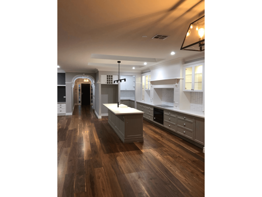 Large kitchen and storage space with breakfast benchtop in home build