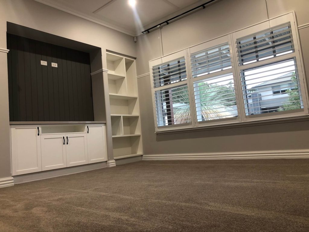 New home build in Officer with carpet and living area with storage and foldable blinds